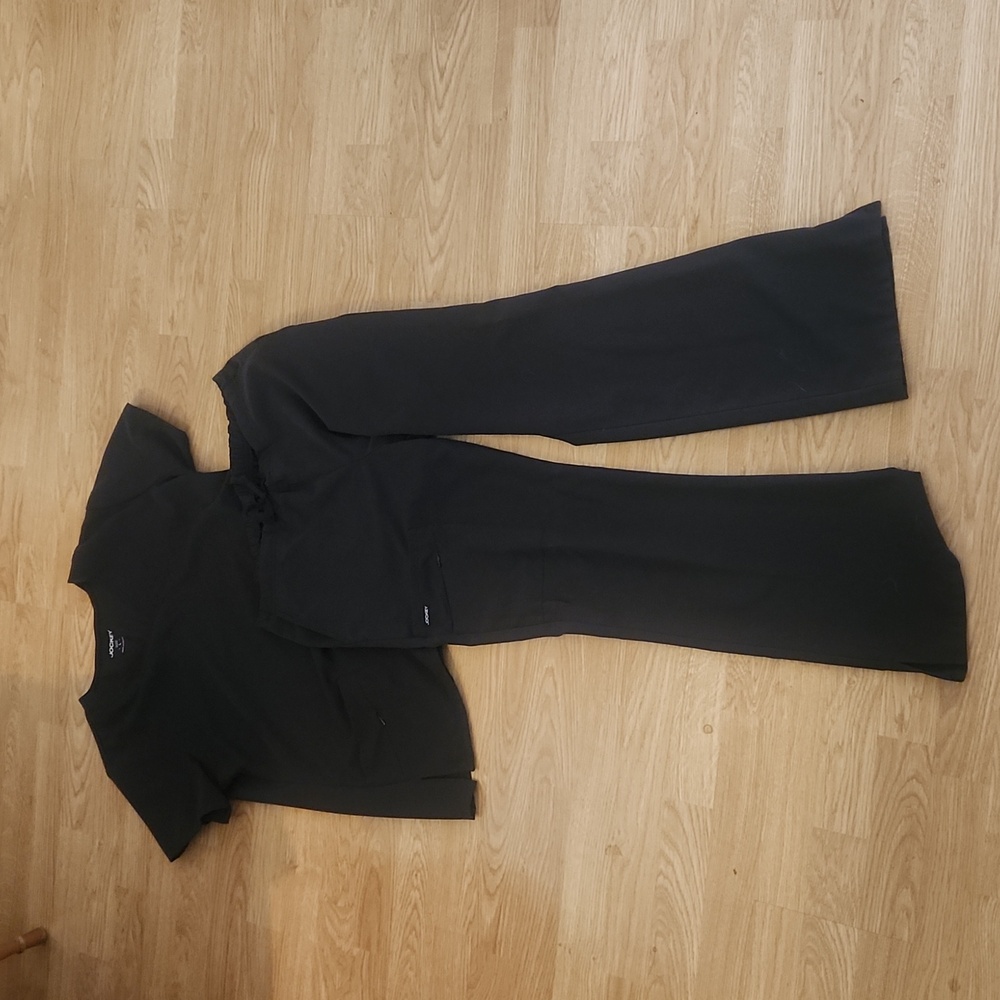 Jockey scrubs. Large top Medium bottom.